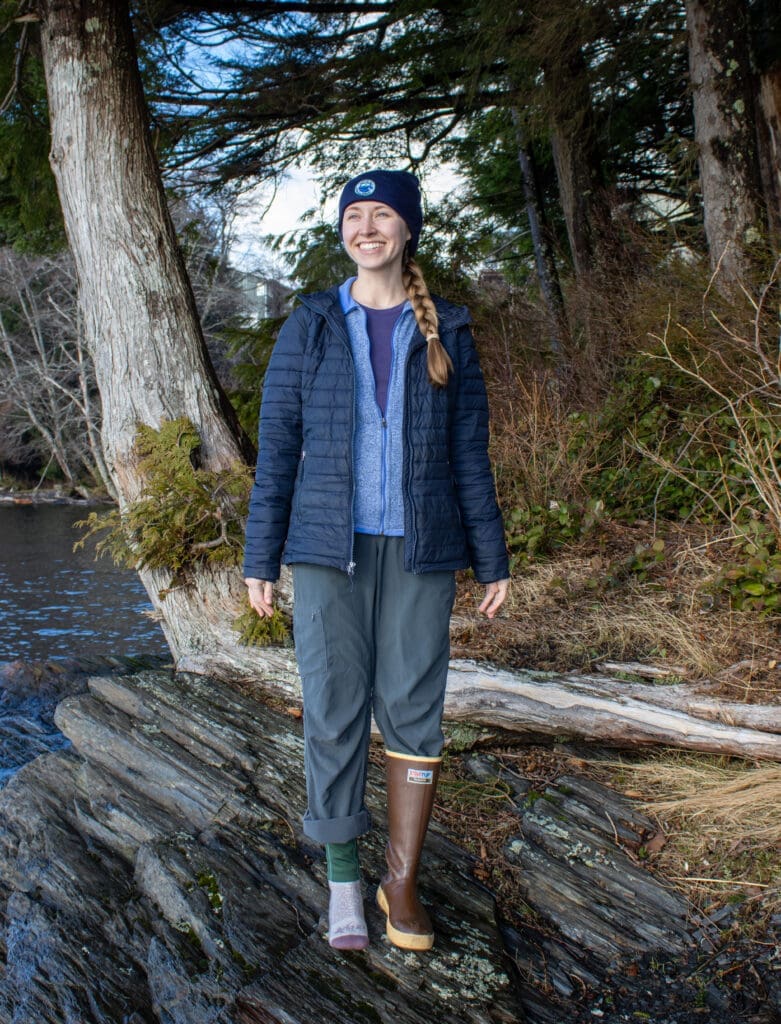 Dressed in Layers A woman in outdoor clothing shows how to dress in layers to stay warm on the water